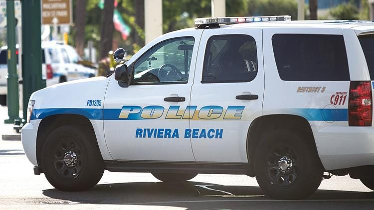 A Riviera Beach police officer and his wife were arrested in St. Lucie County on Sept. 25, 2019 after the couple allegedly stole a repossessed car.