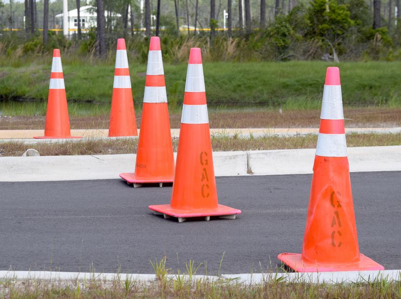 Traffic cones block the entrance of the Panama City Beach Sports Complex, which closed in mid March in light of the COVID-19 virus pandemic.