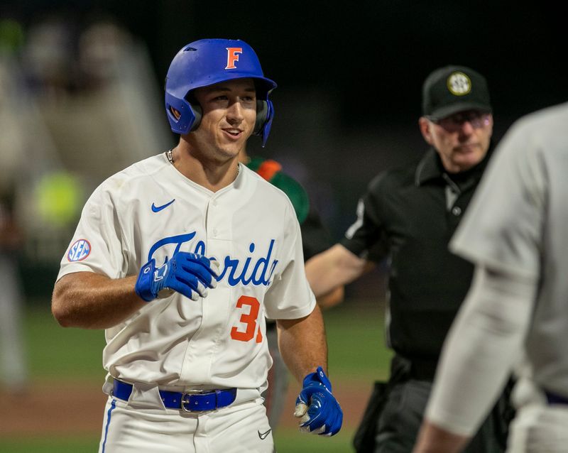 Florida's utility Wyatt Langford (36) with a home run in the bottom of the first inning against the Miami Hurricanes, Friday, March 3, 2023, at Condron Family Baseball Park in Gainesville, Florida. The Gators beat the Hurricanes 10-4 in Game 1. [Cyndi Chambers/ Gainesville Sun] 2023