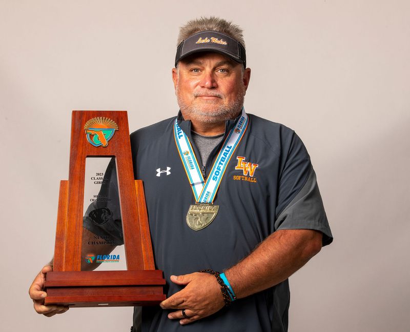 Mike Settle was named The Ledger's coach of the year after leading the Highlanders' softball team to the state championship in 2023. He is stepping down at the end of the season after being named as Florida Polytechnic's first head softball coach for the schools fledgling athletic program.