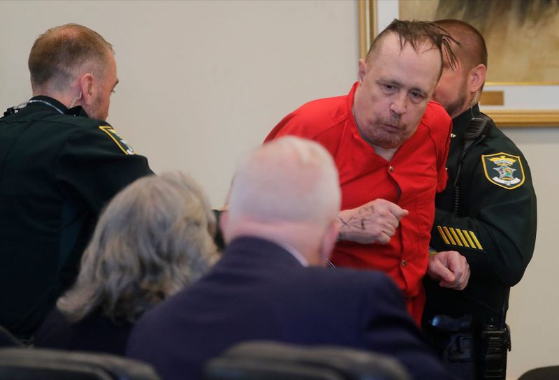 Convicted murderer Joseph Zieler is wrestled to the courtroom floor by Lee County Sheriff's deputies during a motion hearing on Monday, June 26, 2023. Zieler was convicted in the murders of Robin Cornell, 11, and Lisa Story.