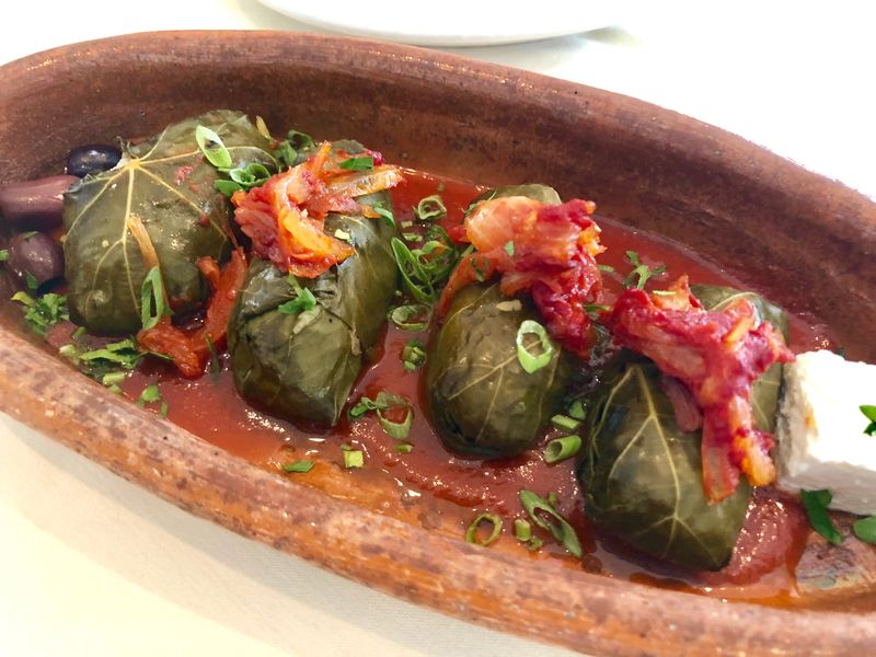 Grape leaves stuffed with ground lamb, dill, rice and baby garbanzo beans at Bha! Bha! Persian Bistro in downtown Naples.
