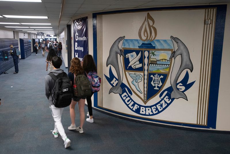 Students fill the hallways at Gulf Breeze High School during class changes on Wednesday, Sept. 18, 2019.