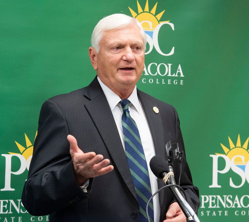 Pensacola State College President Ed Meadows thanks Ron and Jan Miller for their $2.5M donation to the college during a ceremony on Monday, Oct. 28, 2019.