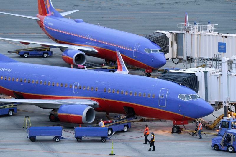 In this 2014 file photo, Southwest airline jets arrive at gates at T.F. Green Airport.