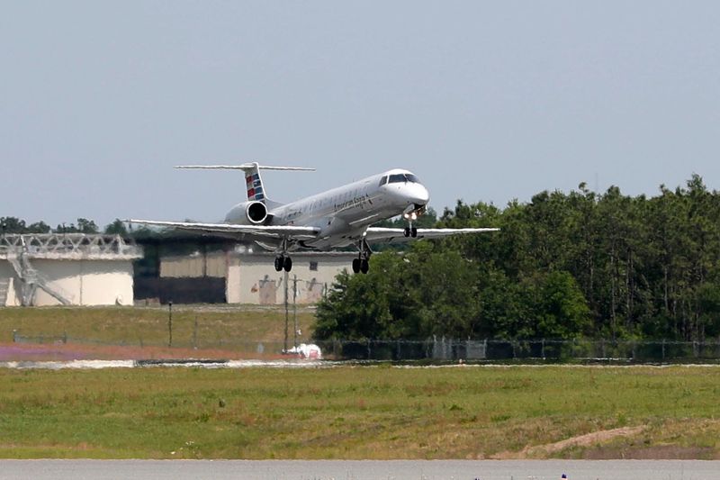 An American Airlines commercial plane approaches the tarmac to land at the Tallahassee International Airport Tuesday, April 23, 2019.