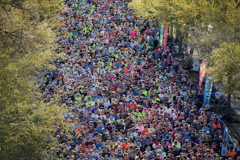 Runners await the start of Saturday's Gate River Run from their holding areas on Duval Street. Over 12,300 runners were registered to run in the 15K 2020 Gate River Run Saturday, March 7, 2020. [Bob Self/Florida Times-Union]