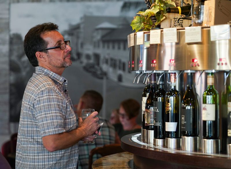 Customers enjoy wine and beer on Friday, July 30, 2021, at Vine & Barley in downtown Stuart. After Labor Day, the wine and craft beer lounge is set to close. The owner, Mark Carbone, said that the high rent increase forced the decision to close in downtown Stuart.