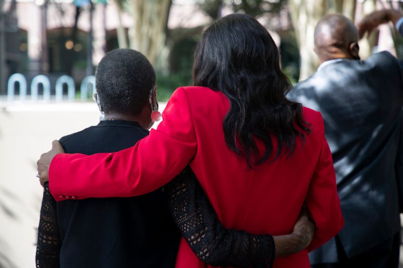 Former mayor Dorothy "Dot" Inman-Johnson, Tallahassee's first African-American woman city commissioner and Mayor Pro Tem Dianne Williams-Cox, Tallahassee's second African-American woman city commissioner, hug after the park in Kleman Plaza was dedicated to Inman-Johnson Monday, Oct. 26, 2020.