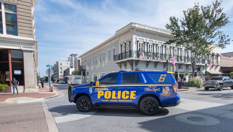 Public Information Officer Mike Wood drives through downtown in the new Blue Angels-themed Pensacola Police Department vehicle in Pensacola on Wednesday, Nov. 3, 2021.  The vehicle was designed to celebrate the city's bicentennial in conjunction with the Blue Angels' 75th anniversary.