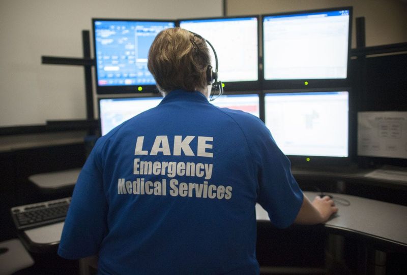 Dispatchers respond to 911 calls at the Emergency Operations Center in Tavares.