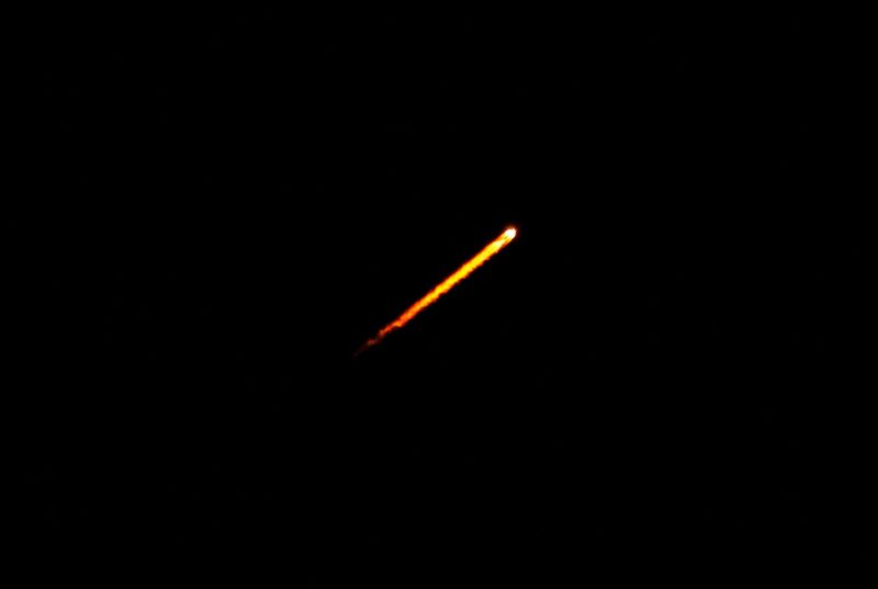 SpaceX Falcon 9 rocket rises above West Palm Beach, Florida, after its 5:21 a.m. launch from Cape Canaveral Saturday, June 13, 2020. Aboard are 58 Starlink communication satellites, on the ninth Starlink mission for SpaceX. [LANNIS WATERS/palmbeachpost.com]