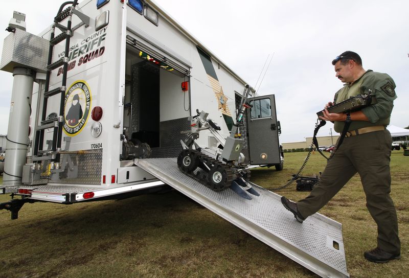 Volusia County Bomb Squad deputy Randy Carlson demonstrates one of the bomb squad robots during RoboBoat Community Event at Reed Canal Park in South Daytona, Saturday, June 22, 2019. [News-Journal/Nigel Cook]