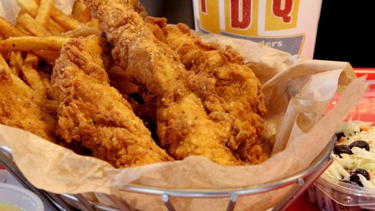 Chicken tenders with blueberry coleslaw are served at PDQ restaurant in West Palm Beach. (Taylor Jones/The Palm Beach Post)