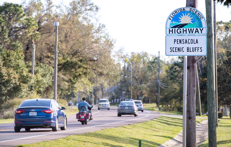 Vehicles make their way along Scenic Highway in Pensacola on Monday, March 22, 2021.