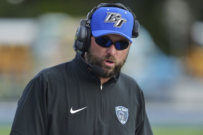 Bartram Trail coach Cory Johns looks on from the sidelines during a 2023 game against Riverside.