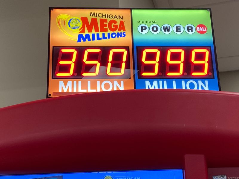 Mega Millions and Powerball sign show the totals for $350 million and $999 million, respectively. Powerball drawing for Saturday, Oct. 7, 2023, was for $1.4 billion, but the sign could not display that total.