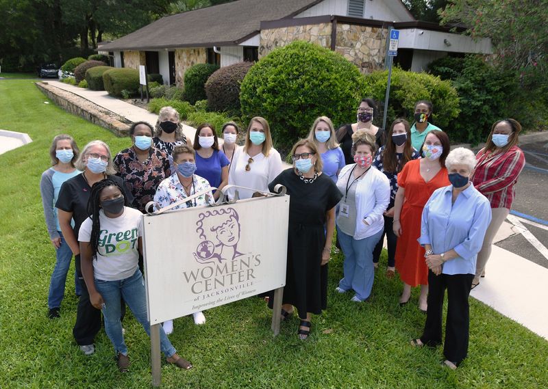 Teresa Miles, center, executive director of the Women's Center of Jacksonville, is with staff and board members outside their Jacksonville offices in 2020.
