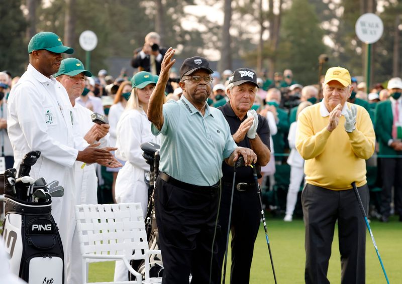 Lee Elder acknowledges the crowd before the honorary start of Thursday's first round for the Masters at Augusta National Golf Club, Thursday, April 8, 2021, in Augusta, Georgia.