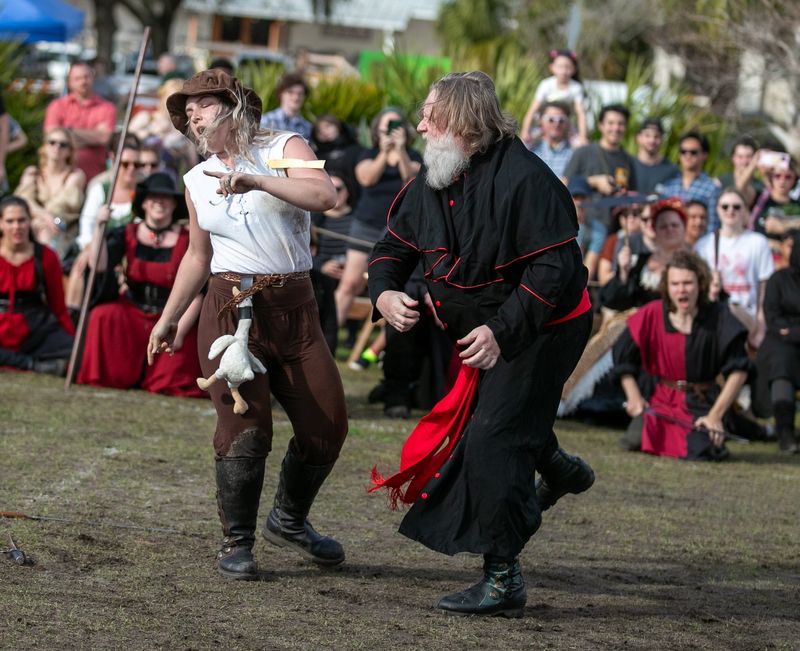 Re-enactors perform in battle chess during the annual Hoggetowne Medieval Faire at Depot Park in Gainesville, FL on Saturday, January 27, 2024. The medieval festival featured everything from minstrels and magic to battle chess.