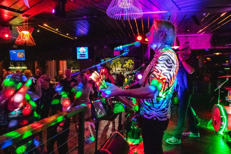 Members of One80Band entertain the crowd at Cavo in the Mercato shops of Naples on the night of Jan. 27, 2024.