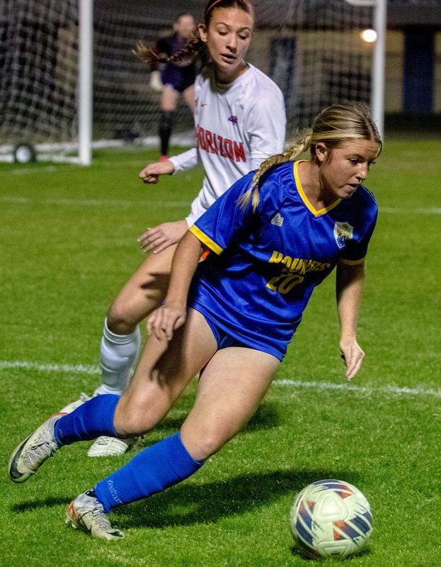 Auburndale sophomore McKenna Battilla makes a move around a Horizon defender in the championship match of the Class 4A, District 5 girls soccer tournament.