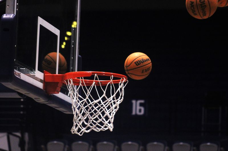 STOCK | Basketballs fly toward a hoop during Ponte Vedra High School boys basketball practice at the University of North Florida in Jacksonville, Florida, on February 29, 2024. [Clayton Freeman/Florida Times-Union]