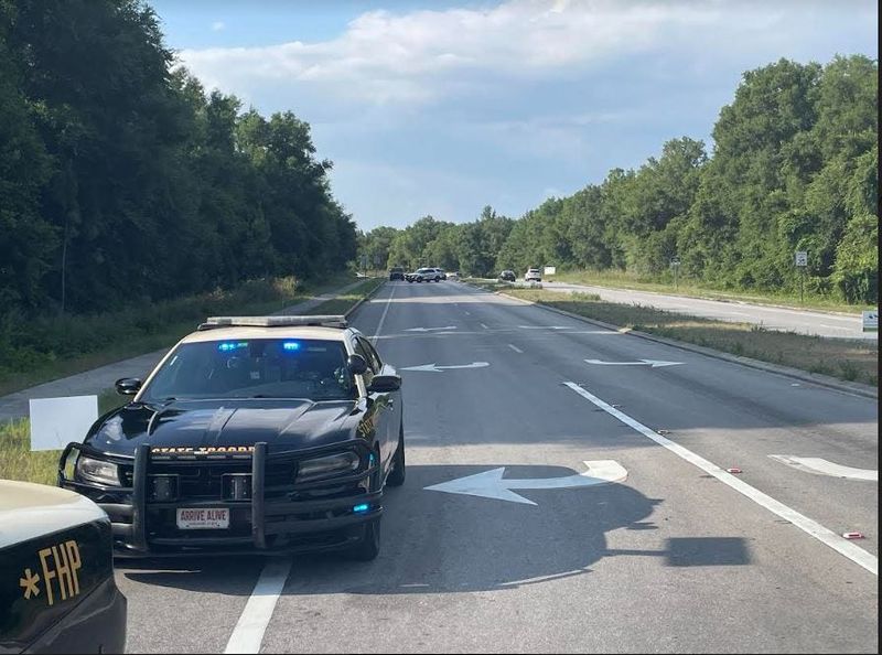 FHP cruiser blocked traffic along Southwest 95th Circle to investigate a traffic death.