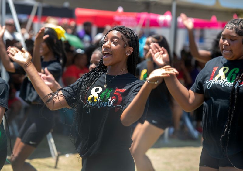 The Pensacola Red Diamonds perform for the crowd during Juneteenth A Family Reunion for the Culture at Museum Plaza in downtown Pensacola Saturday, June 15, 2024.