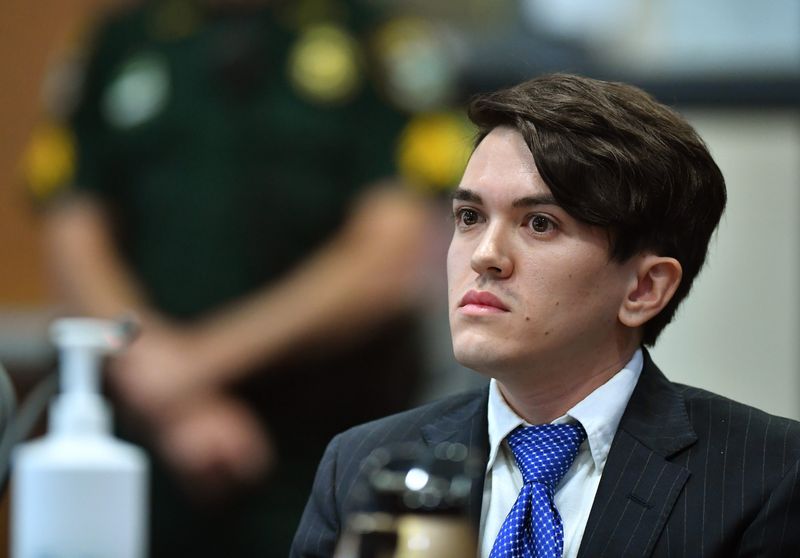 Brennan Wakey listens to testimony during a stand your ground hearing Friday in Sarasota, Wakey, 28, is charged with second degree murder and altering, concealing evidence in connection to a 2021 fatal shooting at the Hyatt Place Hotel off University Parkway, where police discovered the body of Colton Wright. Wakey claims he fired his gun, which has not been found, in self-defense.