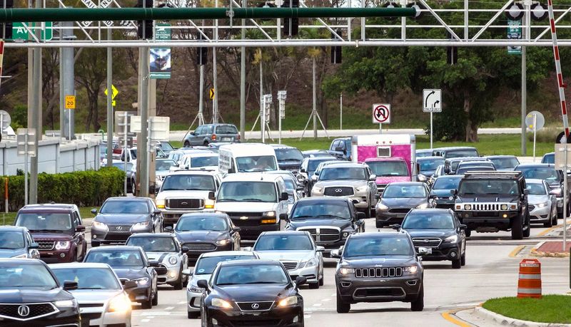 Rush hour traffic on Okeechobee Boulevard heads toward downtown West Palm Beach and Palm Beach Friday morning, March 29, 2019.