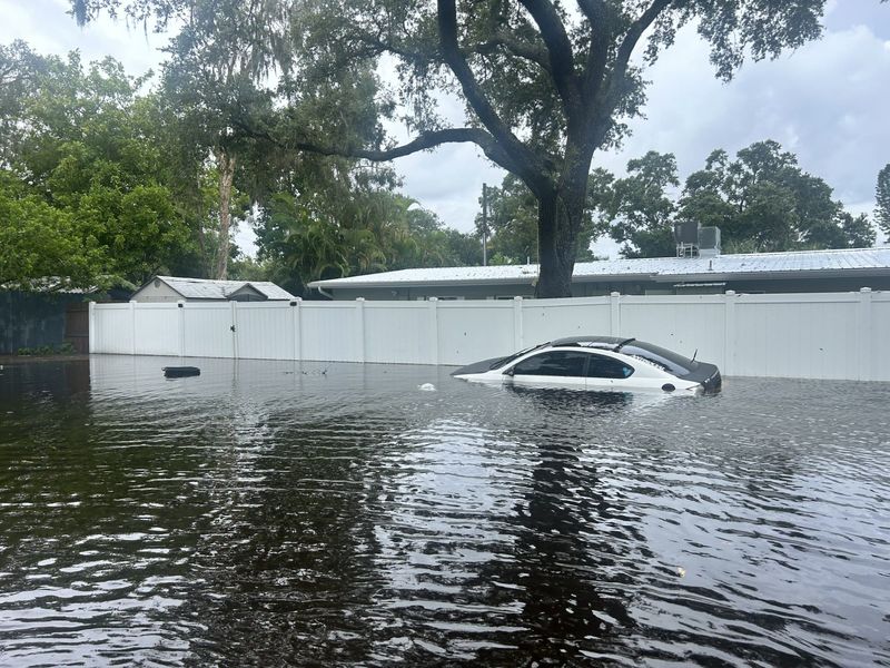 Floodwater the Bellevue Terrace/Locklear Park neighborhood Monday, Aug. 5, after drenching rains from Hurricane Debby.