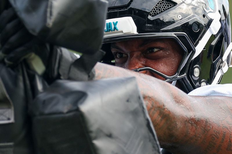 Jul 26, 2024; Jacksonville, FL, USA; Jacksonville Jaguars defensive tackle Maason Smith (94) participates in training camp at Miller Electric Center. Mandatory Credit: Nathan Ray Seebeck-USA TODAY Sports