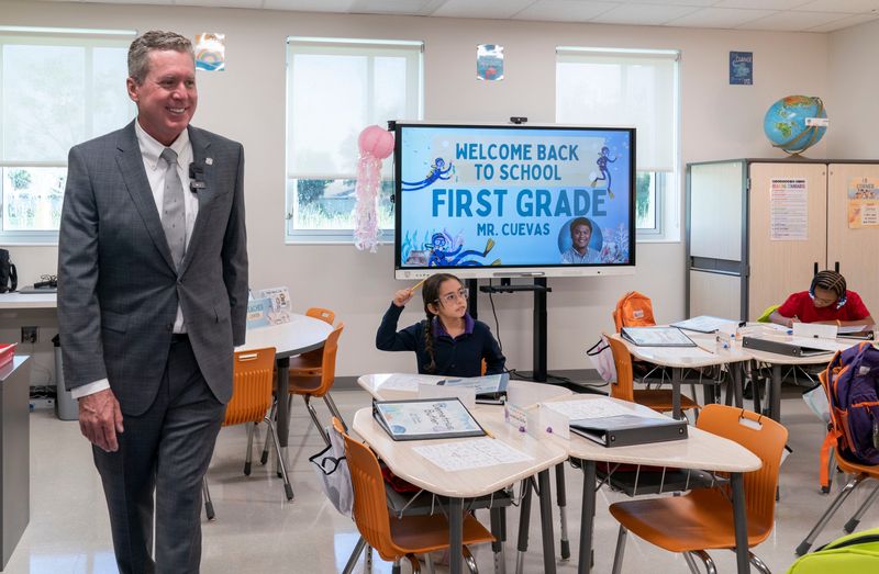 Palm Beach County Schools Superintendent Mike Burke visits a classroom on the first day of school at Grove Park Elementary School in Palm Beach Gardens in August 2024.