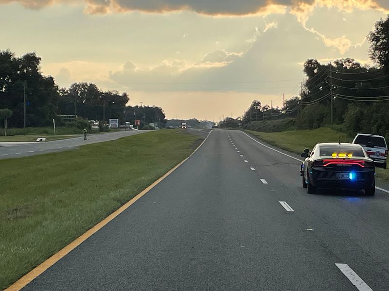 A section of County Road 484 was blocked by sheriff's deputies on Wednesday, Aug. 14, 2024 so FHP troopers could investigate a single-vehicle crash that claimed the life of a woman.