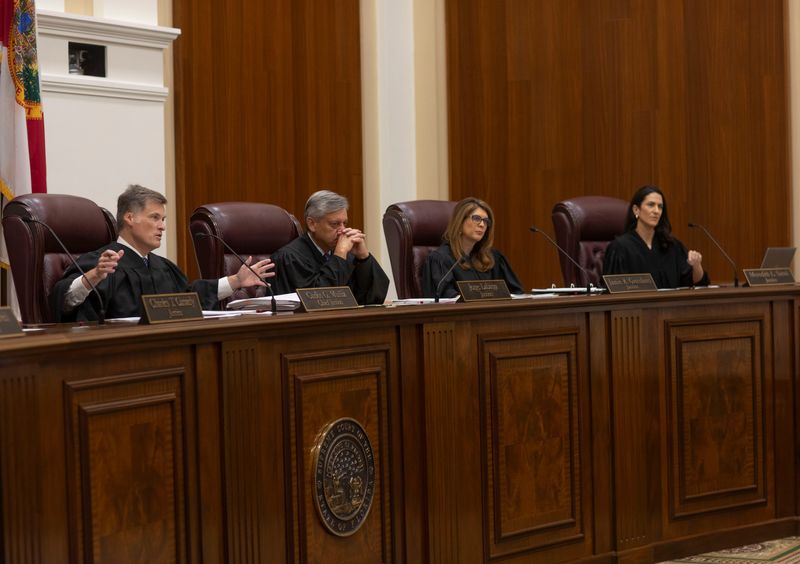 Florida Supreme Court Chief Justice Carlos G. Muñiz speaks during a hearing of oral arguments at the Florida Supreme Court on Thursday, Sept. 12, 2024. The hearing regards Florida's redistricting map approved by Gov. Ron DeSantis in 2022.