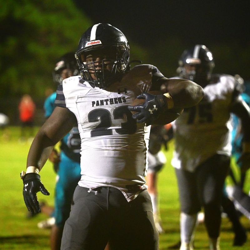 Dwyer's Sylvio Joseph strikes a pose after entering the end zone during a game win against Royal Palm Beach on Sept. 13, 2024.