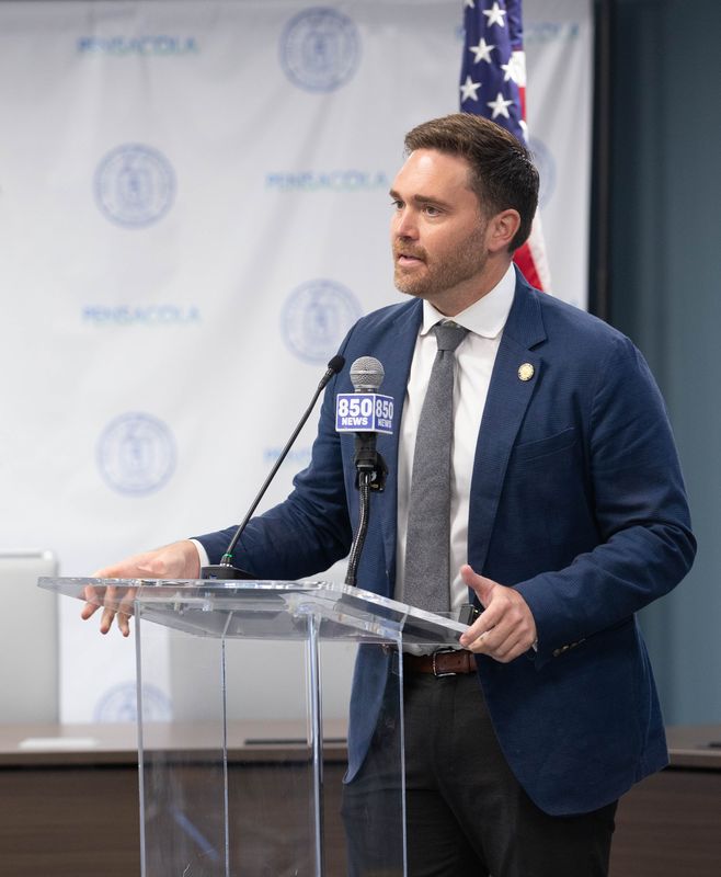 Mayor D.C. Reeves introduces former NAS commander Capt. Tim Kinsella as the new city administrator during a press conference at City Hall in Pensacola on Tuesday, Sept. 17, 2024.