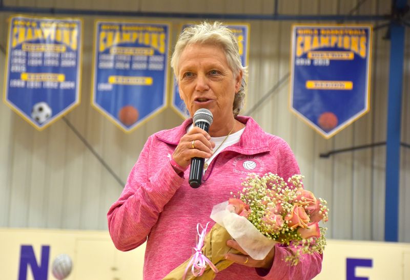 Lake Worth Christian head coach Terri Kaiser speaks to the audience during a "Volley for the Cause" event in support of her battle against cancer (Oct. 3, 2024).
