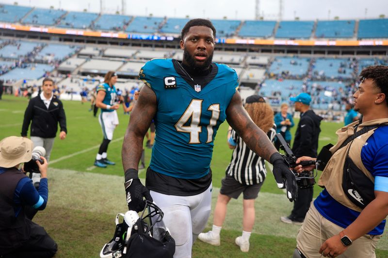 Jacksonville Jaguars defensive end Josh Hines-Allen (41) walks off the field after an NFL football matchup Sunday, Oct. 6, 2024 at EverBank Stadium in Jacksonville, Fla. The Jaguars edged the Colts on a field goal 37-34. [Corey Perrine/Florida Times-Union]