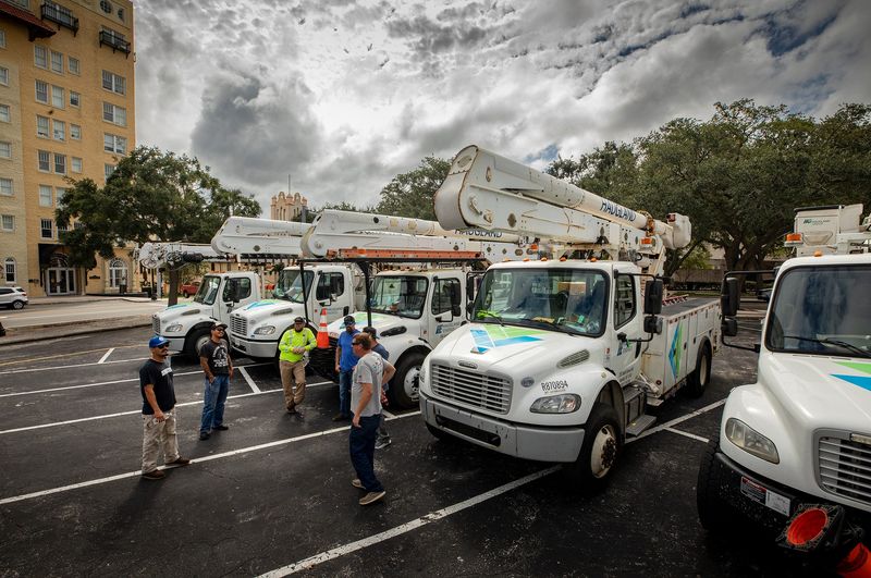 Power crews from Haugland Energy stage in the parking lot next to the Terrace Hotel as they prepare for Hurricane Milton Tuesday October 8 2024, in Lakeland Fl.
Ernst Peters/The Ledger