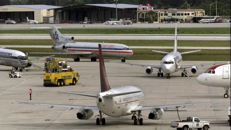Airplanes sit on the tarmac at Palm Beach International Airport