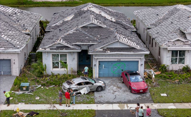 Homes and cars were damaged in the Avenir development by a tornado from Hurricane Milton on October 10, 2024 in Palm Beach Gardens, Florida..
