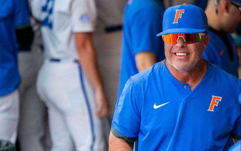 Florida head coach Kevin O'Sullivan celebrates the win of the NCAA Regionals game against Texas Tech, Monday, June 5, 2023, at Condron Family Ballpark in Gainesville, Florida. Florida beat Texas Tech 6-0 and advances to Super Regionals. [Cyndi Chambers/ Gainesville Sun] 2023