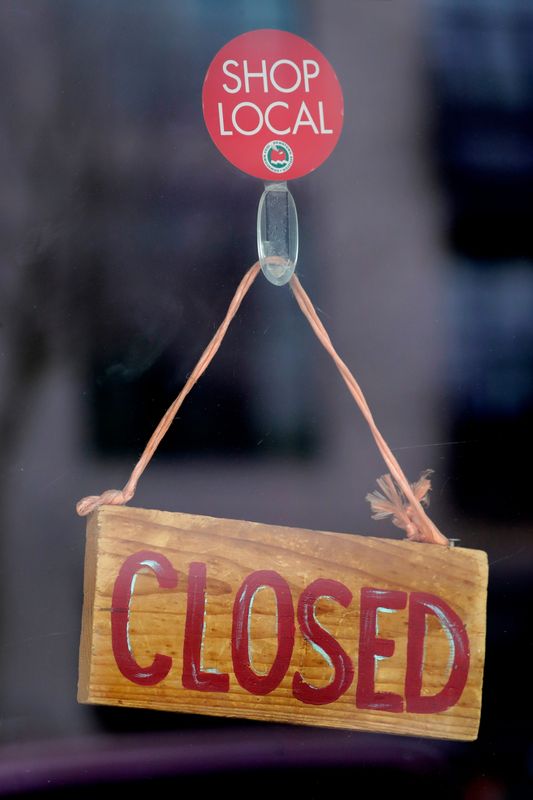 A closed sign hangs on the front door of Antojitos Mexicanos restaurant Thursday, March 19, 2020, in downtown Appleton, Wis.