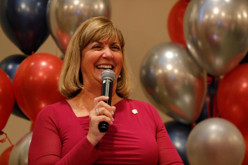 Denise Carlin addresses supporters during her election night watch party hosted at The Club at Pelican Preserve in Fort Myers, Tuesday, Nov. 5, 2024. Republican candidates gathered to celebrate victories including the school superintendent race, which was won by Carlin.