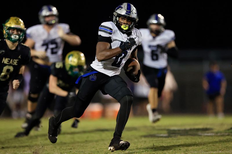 Bartram Trail's Arthur Lewis IV (0) scores a touchdown during the second quarter of a high school football matchup Thursday, Nov. 7, 2024 at Nease High School in Ponte Vedra Beach, Fla.