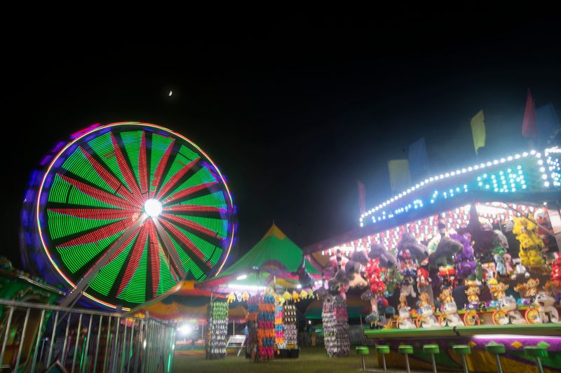 A long exposure photograph of rides at the 2024 North Florida Fair Thursday, Nov. 7, 2024.