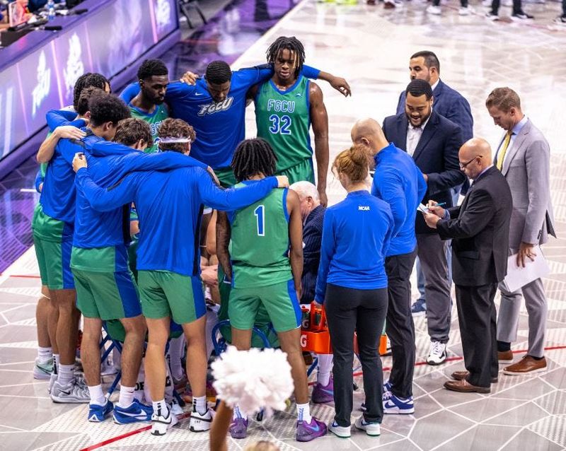 The FGCU Eagles huddle around head coach Pat Chambers during their 67-51 loss to TCU in Fort Worth, Texas on Friday, Nov. 8, 2024.