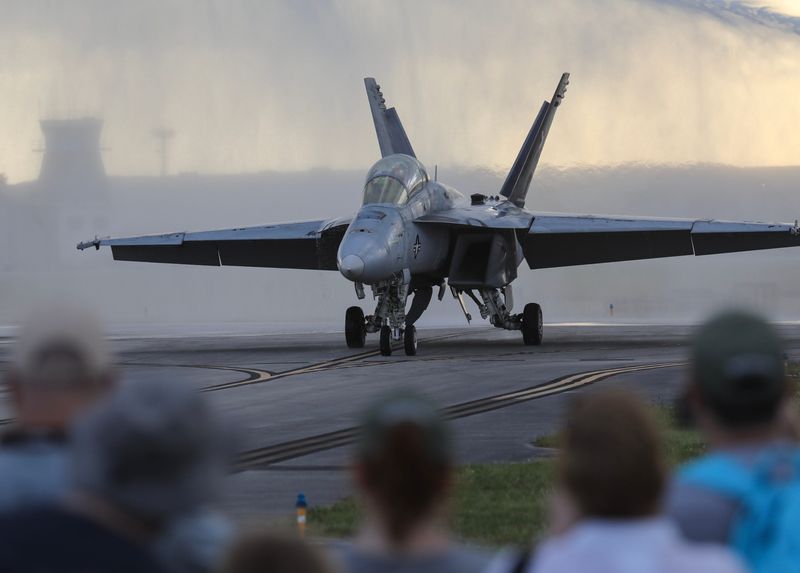 Hundreds of aviation fans attend the 35th annual Stuart Air Show on Saturday, Nov. 9, 2024, at Witham Field in Stuart. The annual show features aerial performers from military demonstration teams, world-renowned acrobatic pilots, along with vintage aircraft displays and modern military aircraft.